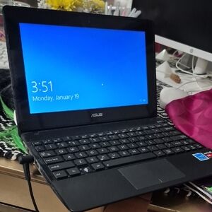 ASUS Black Laptop with Blue Screen